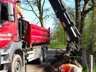 Transport van machinerie en bouwmateriaal